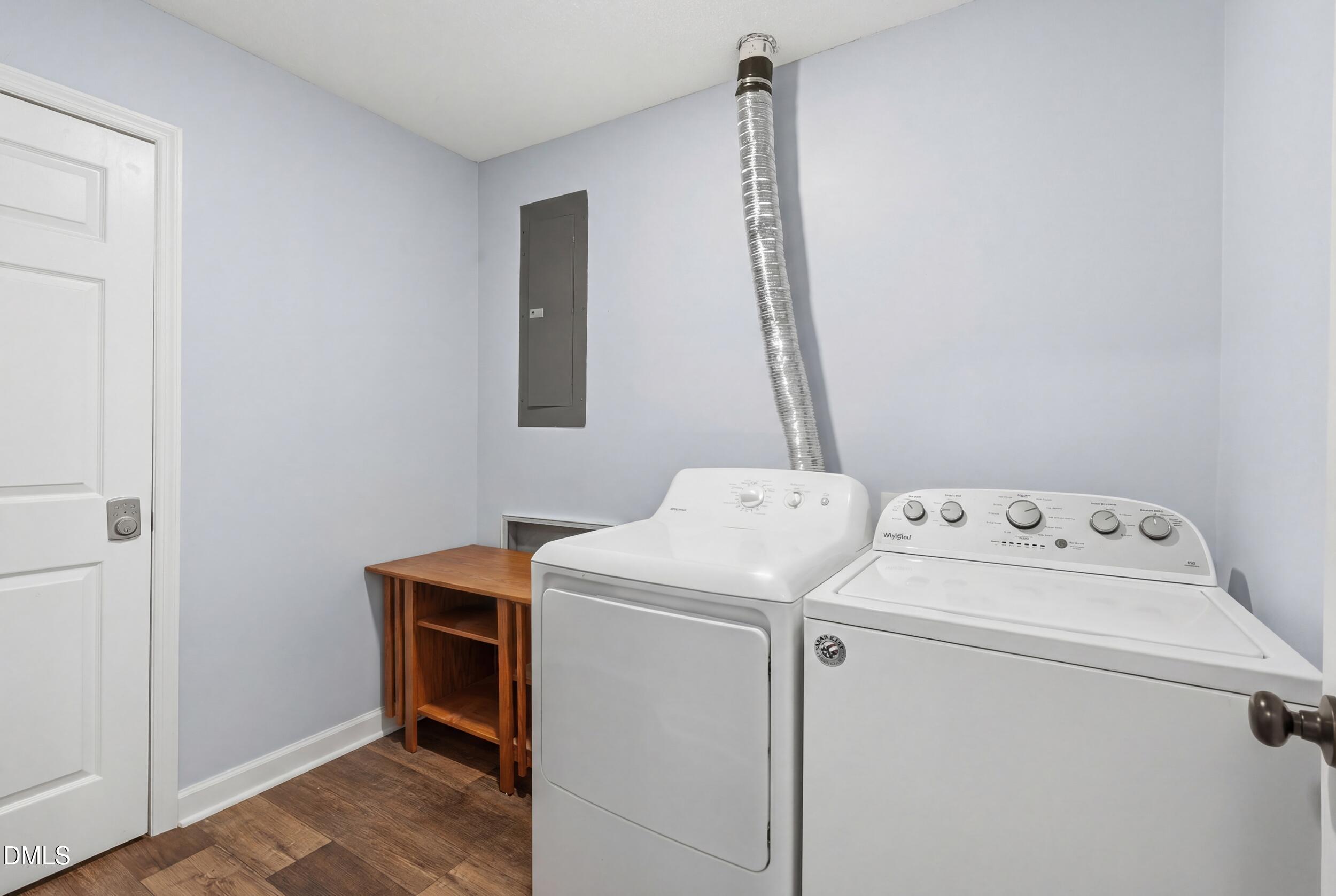 790 New River Inlet Road, Unit 114A North Topsail Beach, NC 28460 - Photo 11 of 46 a utility room with dryer and washer
