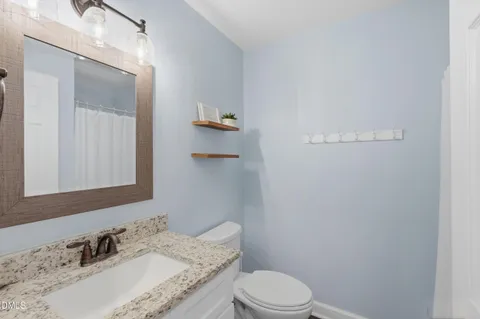 a large white bed in a white room