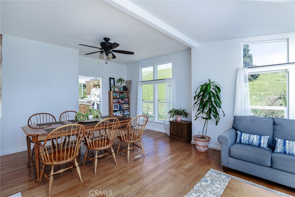 4905 Huasna Road Arroyo Grande, CA 93420 - Photo 11 of 59 a view of a livingroom with furniture window and wooden floor