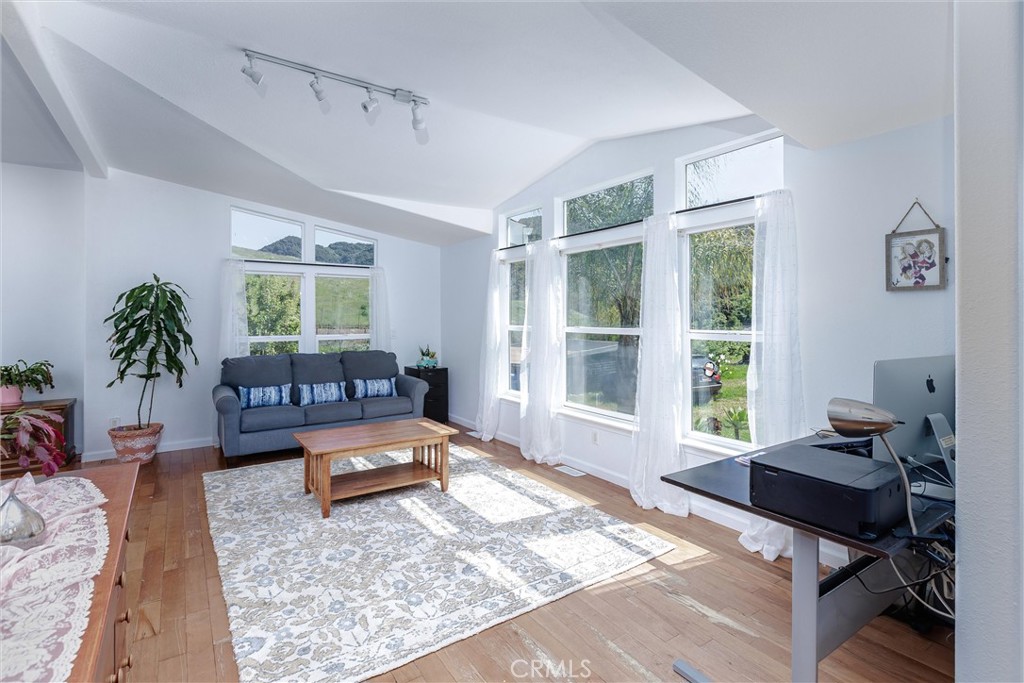 4905 Huasna Road Arroyo Grande, CA 93420 - Photo 12 of 59 a living room with furniture and a window