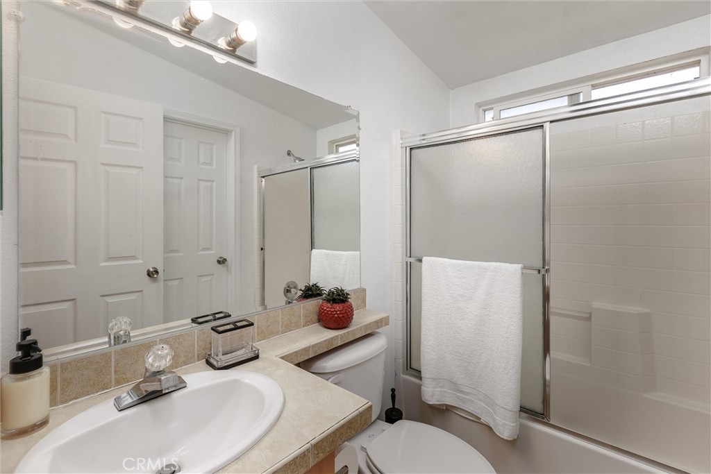 4905 Huasna Road Arroyo Grande, CA 93420 - Photo 20 of 59 a bathroom with a sink toilet and shower