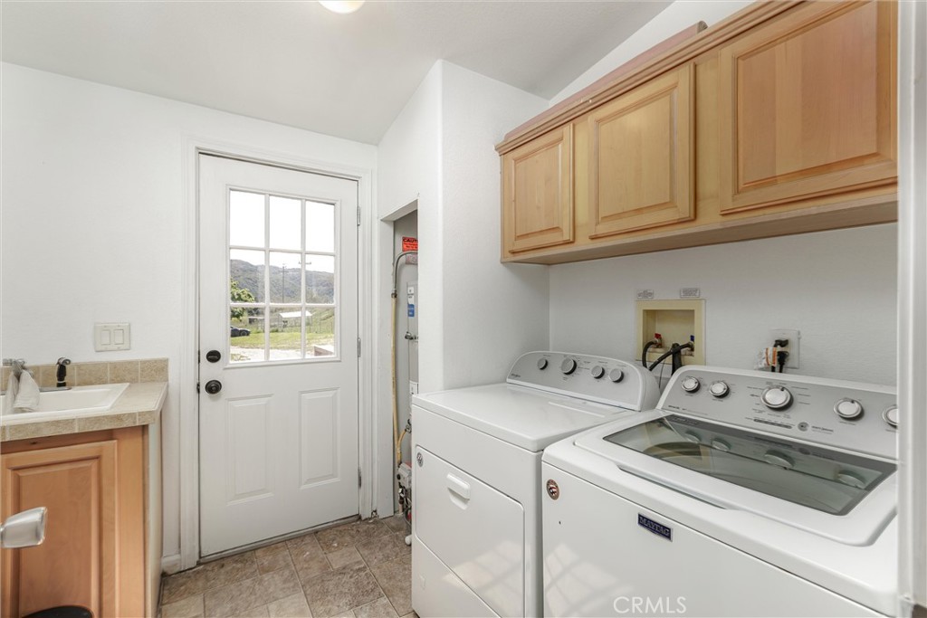 4905 Huasna Road Arroyo Grande, CA 93420 - Photo 21 of 59 a utility room with dryer and washer
