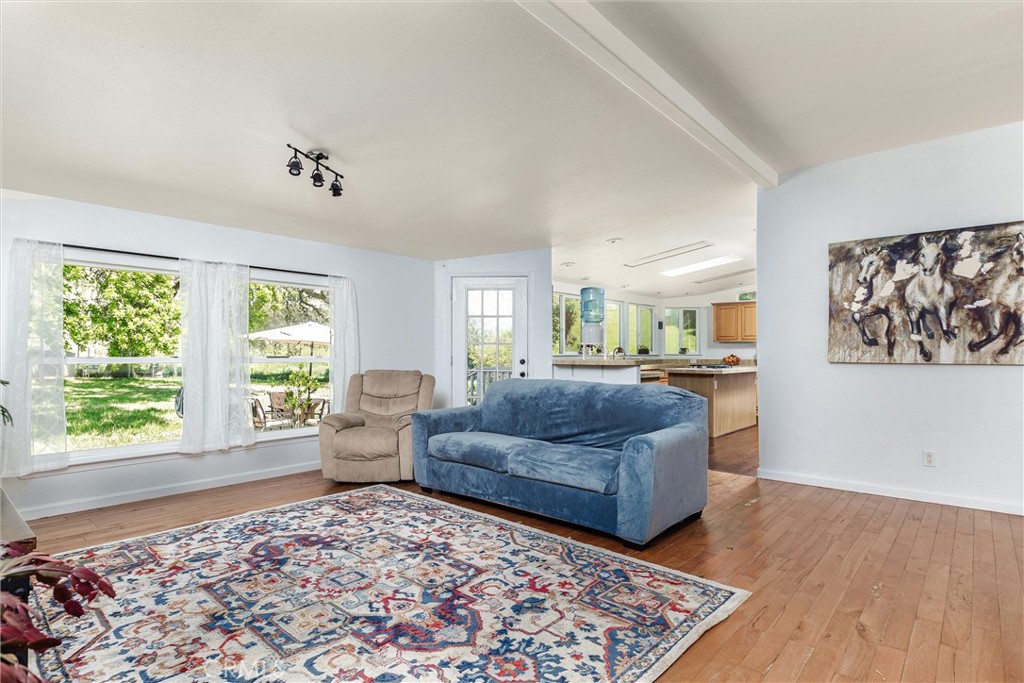 4905 Huasna Road Arroyo Grande, CA 93420 - Photo 5 of 59 a living room with furniture and a large window