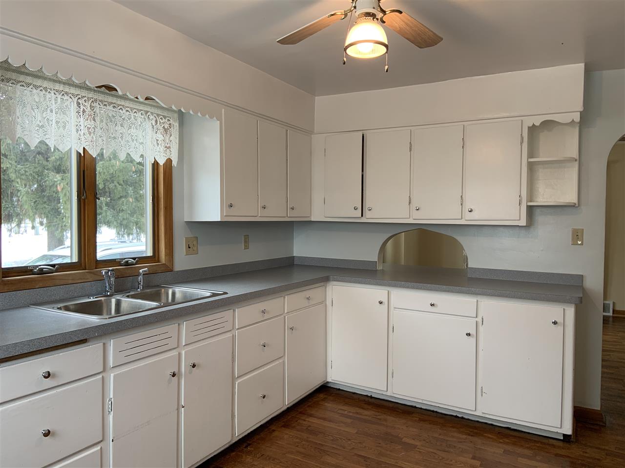 7604 Manchester Road Capron, IL 61012 - Photo 11 of 18 a kitchen with white cabinets and sink