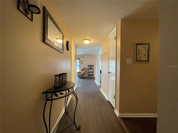a view of a hallway with workspace