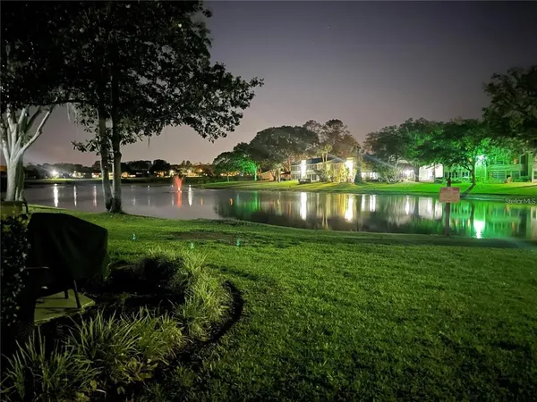 a aerial view of a house with a lake view