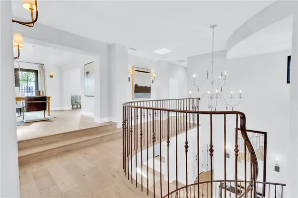 a view of a hallway view with staircase