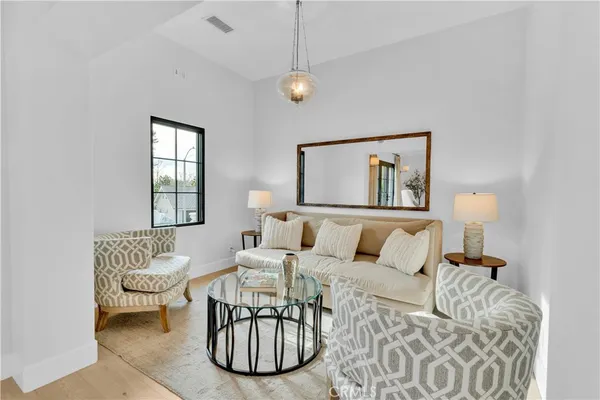 a bedroom with a bed and a couch