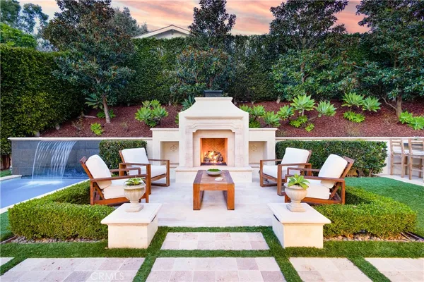 a patio with table and chairs