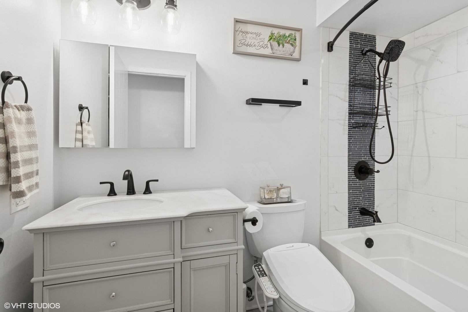 2845 Keystone Road Northbrook, IL 60062 - Photo 18 of 28 a bathroom with a sink toilet vanity and shower