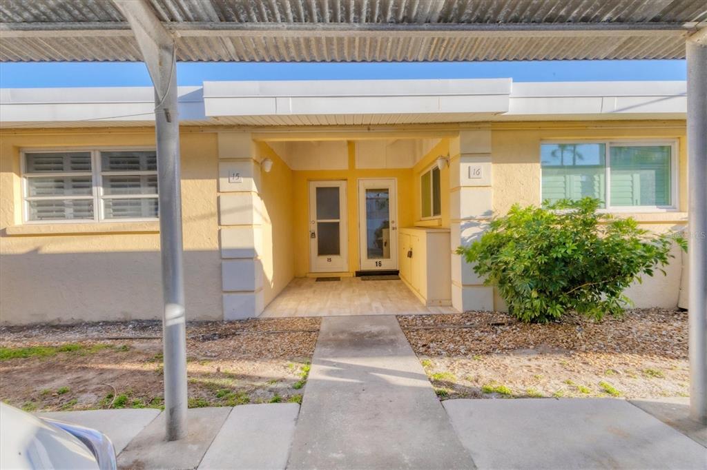 6006 Midnight Pass Road, Unit 15 Sarasota, FL 34242 - Photo 2 of 36 a view of entrance front of house