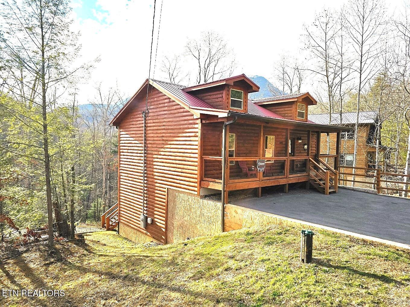 1533 Bear Valley Road Sevierville, TN 37876 - Photo 1 of 41 20241226_152632