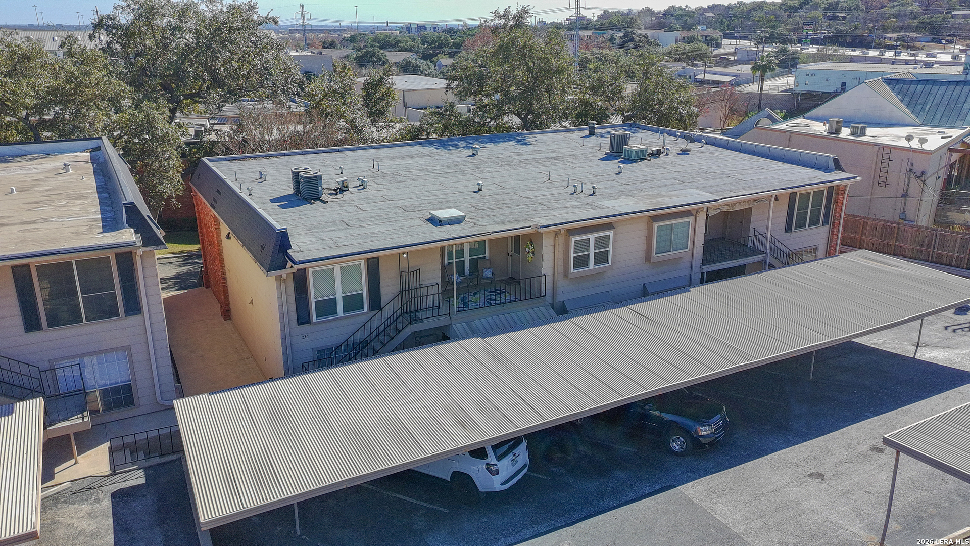 7500 Callaghan Road, Unit 236 San Antonio, TX 78229 - Photo 18 of 19 an aerial view of a house with roof deck