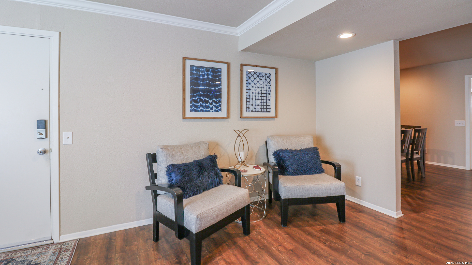 7500 Callaghan Road, Unit 236 San Antonio, TX 78229 - Photo 4 of 19 a living room with furniture and a wooden floor