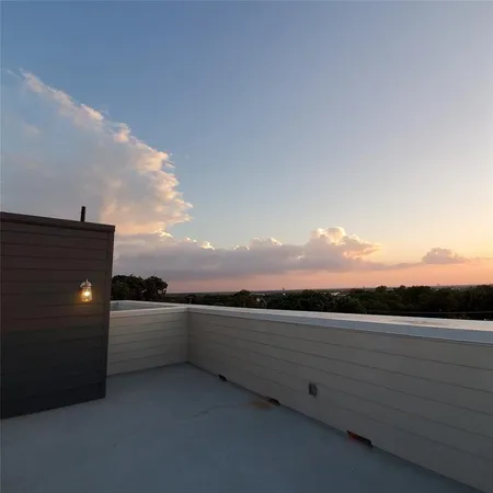 a view of terrace with sunset view