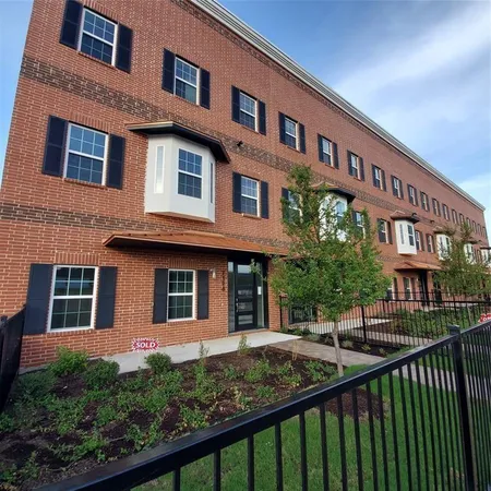 a front view of a building with balcony