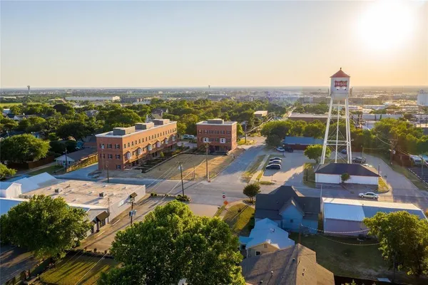 an aerial view of a city with lots of residential buildings