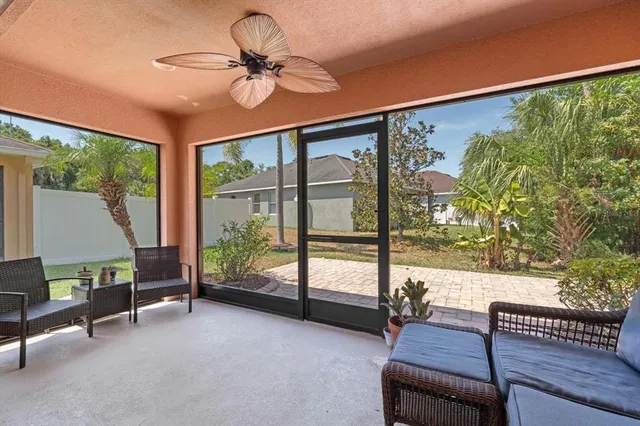 a living room with large windows
