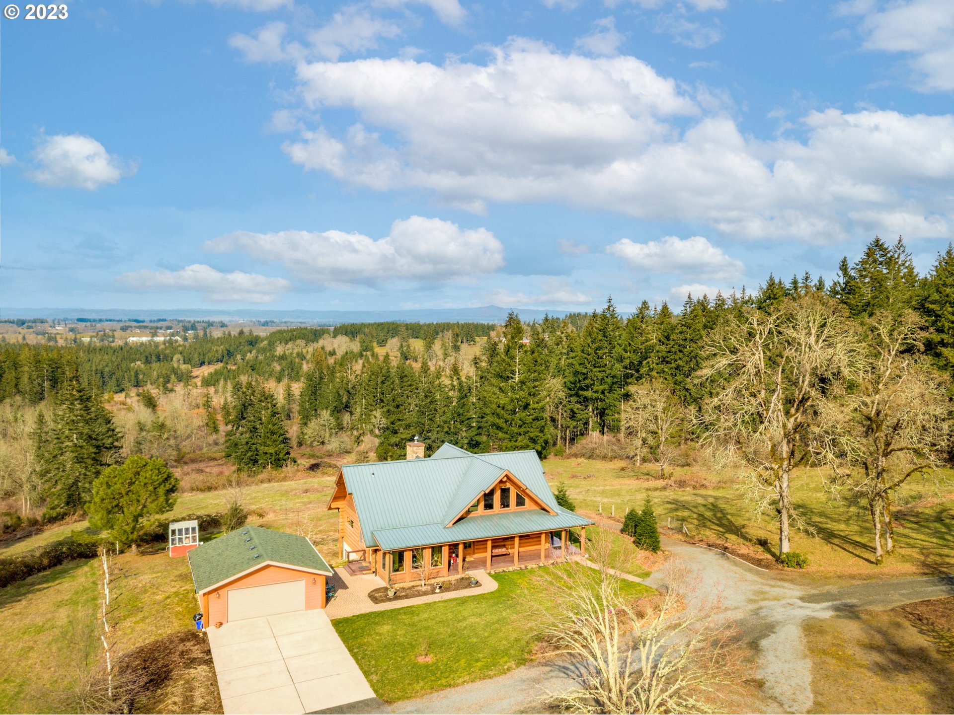 14115 South Leabo Road Molalla, OR 97038 - Photo 3 of 32 a view of a swimming pool with a patio