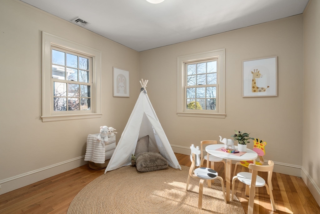 36 Goodnough Road Brookline, MA 02467 - Photo 16 of 31 a view of a room with furniture and wooden floor