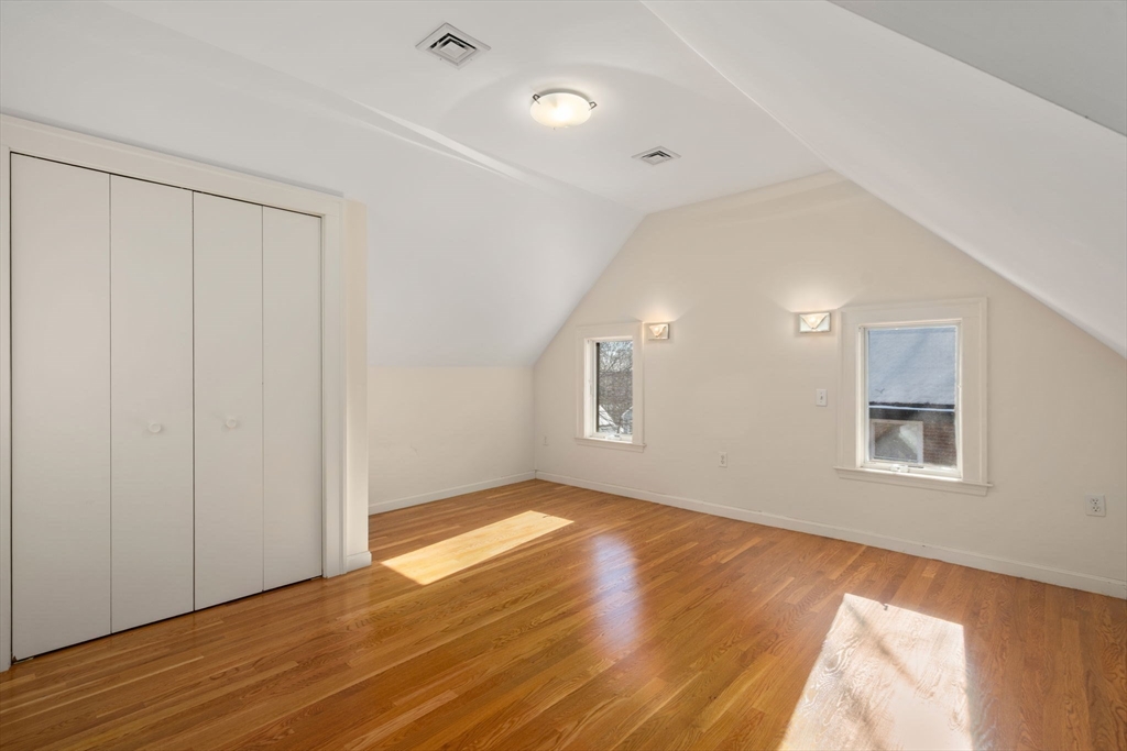 36 Goodnough Road Brookline, MA 02467 - Photo 23 of 31 a view of empty room with wooden floor and fan