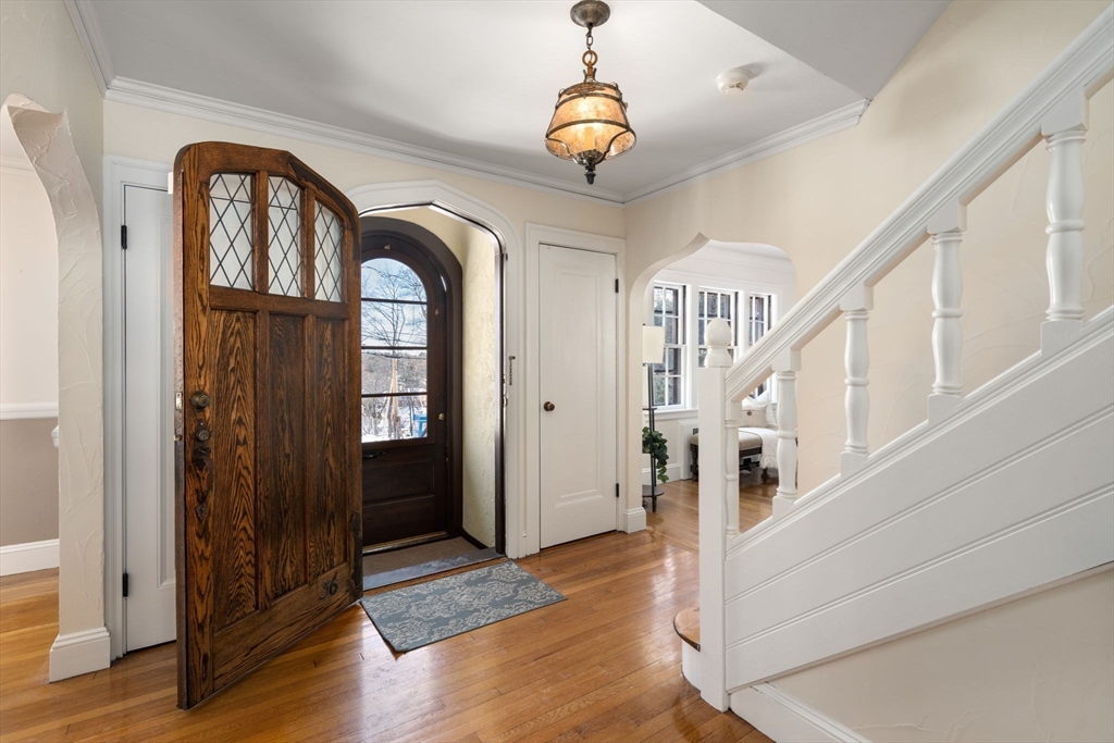 36 Goodnough Road Brookline, MA 02467 - Photo 5 of 31 a view of entryway with wooden floor and stairs