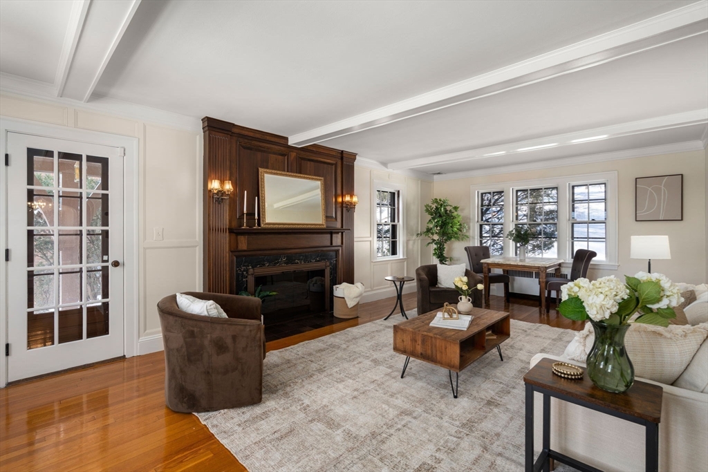 36 Goodnough Road Brookline, MA 02467 - Photo 7 of 31 a living room with furniture a fireplace and a window