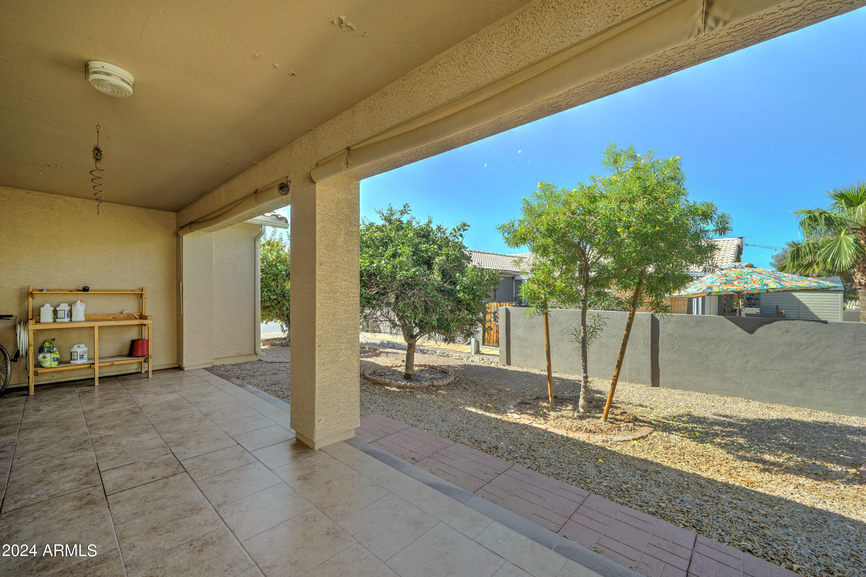 2101 South Meridian Road, Unit 126 Apache Junction, AZ 85120 - Photo 26 of 58 a view of a backyard of a house