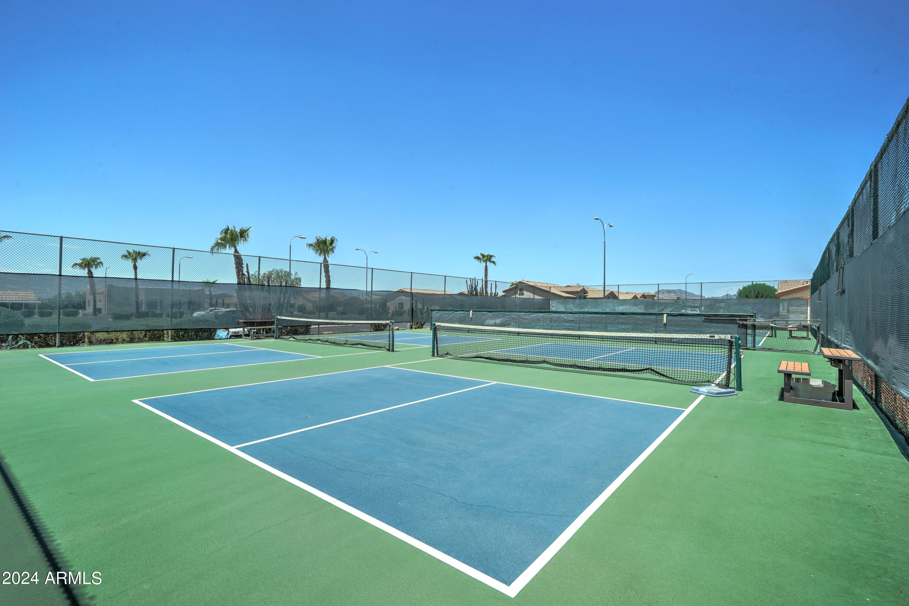 2101 South Meridian Road, Unit 126 Apache Junction, AZ 85120 - Photo 41 of 58 a view of an outdoor space and tennis court