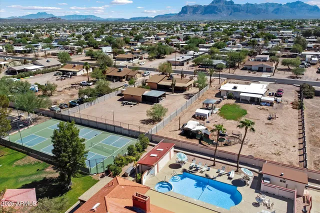 an aerial view of a house with a mountain view