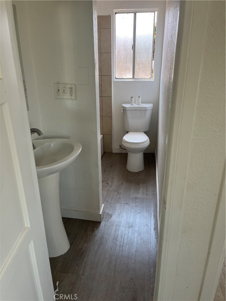 9325 East 8th Street, Unit A Rancho Cucamonga, CA 91730 - Photo 3 of 5 a bathroom with a sink and a toilet