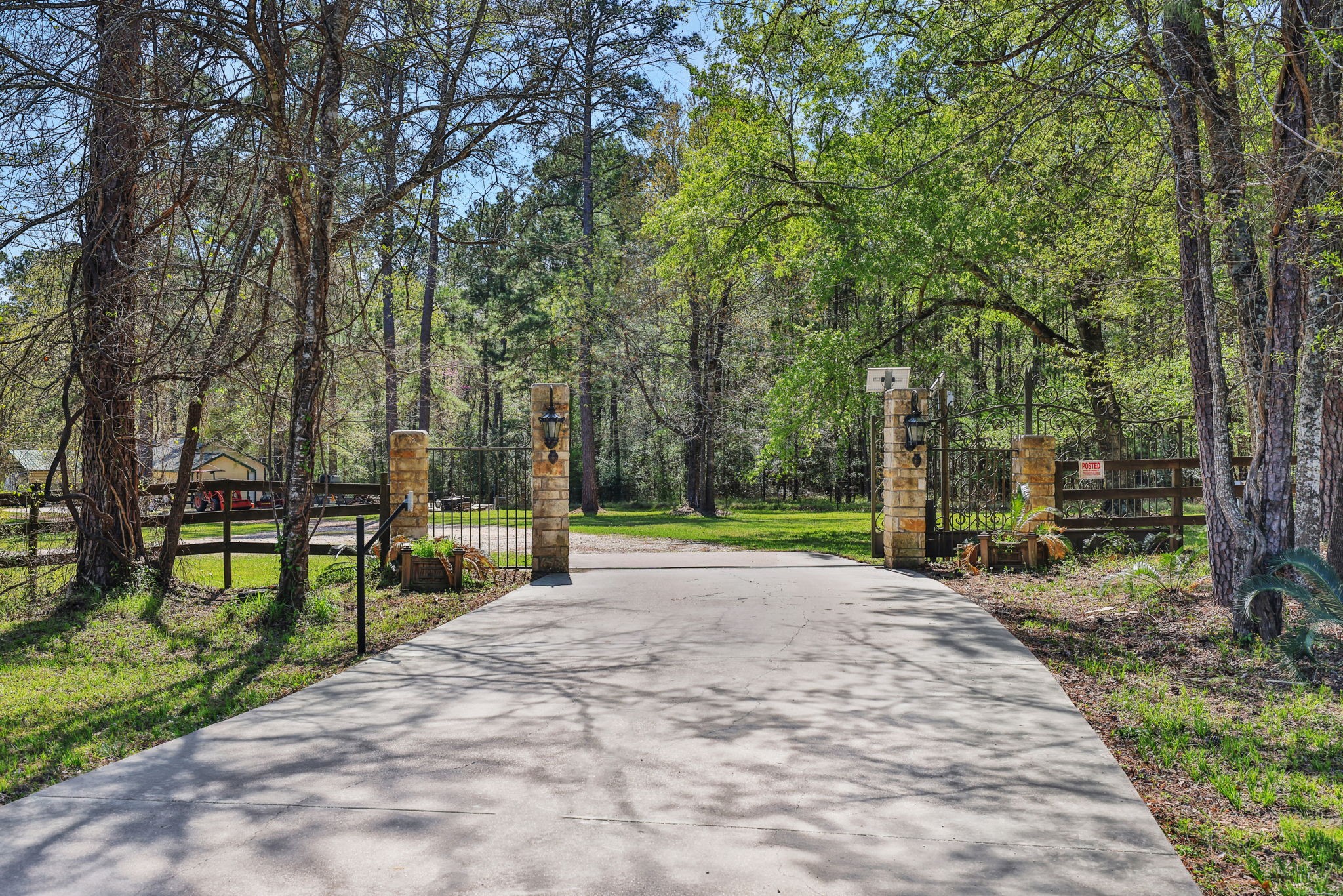 250 Critter Creek Road Coldspring, TX 77331 - Photo 2 of 48 The driveway gate off FM 224 is the start of the property