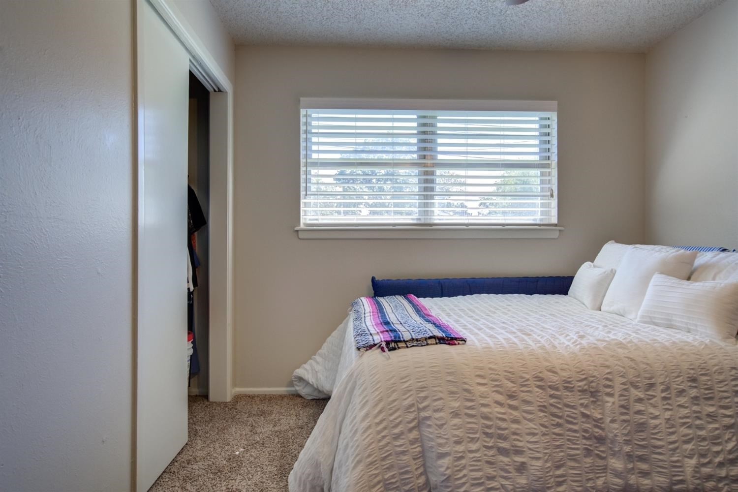 5427 46th Street Lubbock, TX 79414 - Photo 31 of 38 a bedroom with a bed and a window