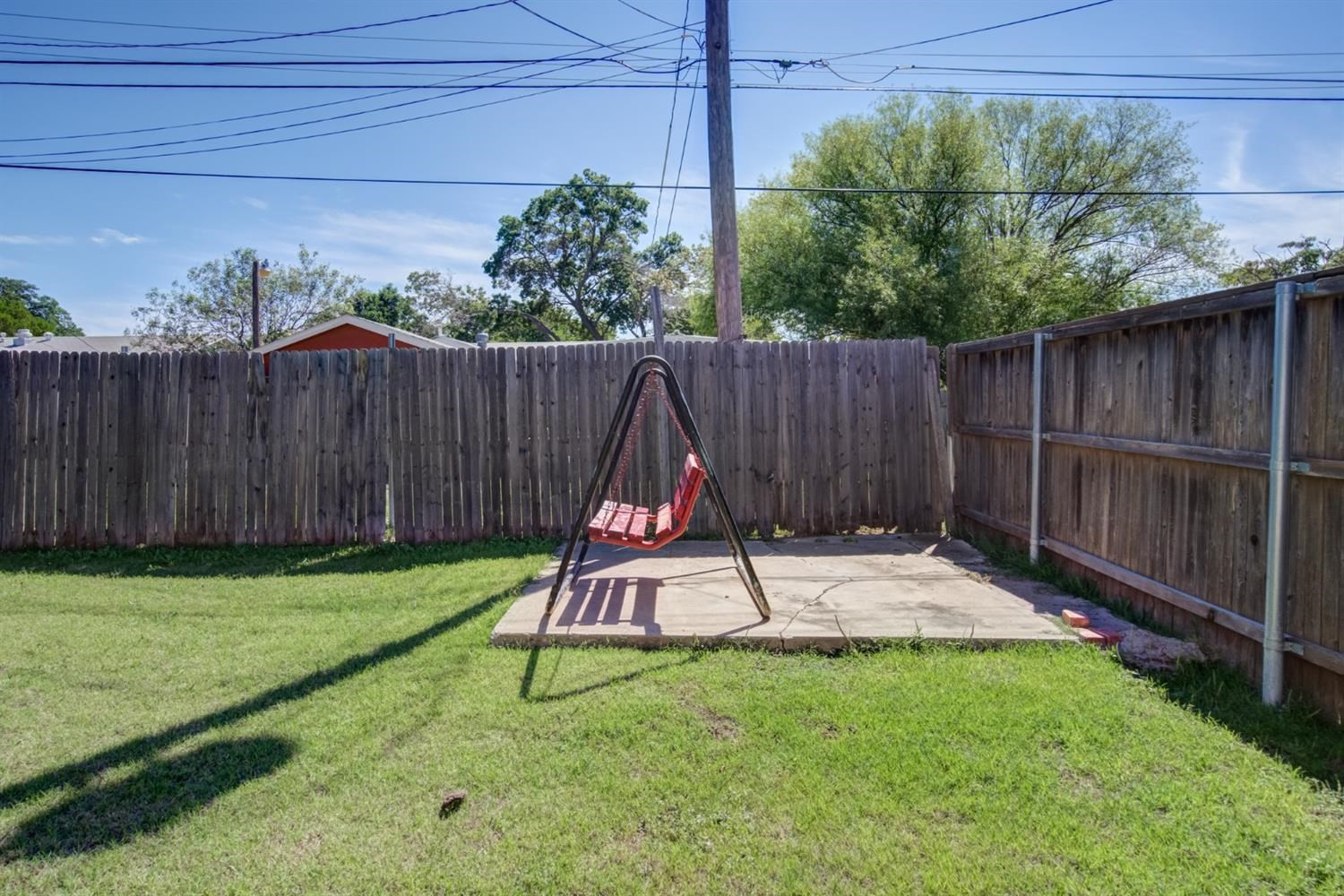 5427 46th Street Lubbock, TX 79414 - Photo 38 of 38 a view of a backyard with wooden fence