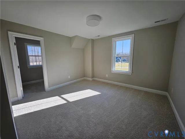 an empty room with windows