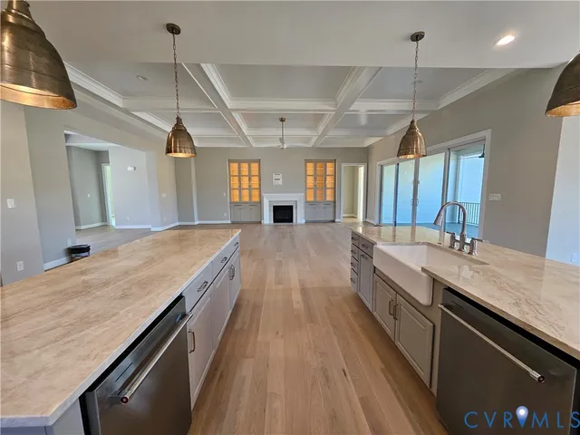 a spacious bathroom with a granite countertop sink and a large mirror