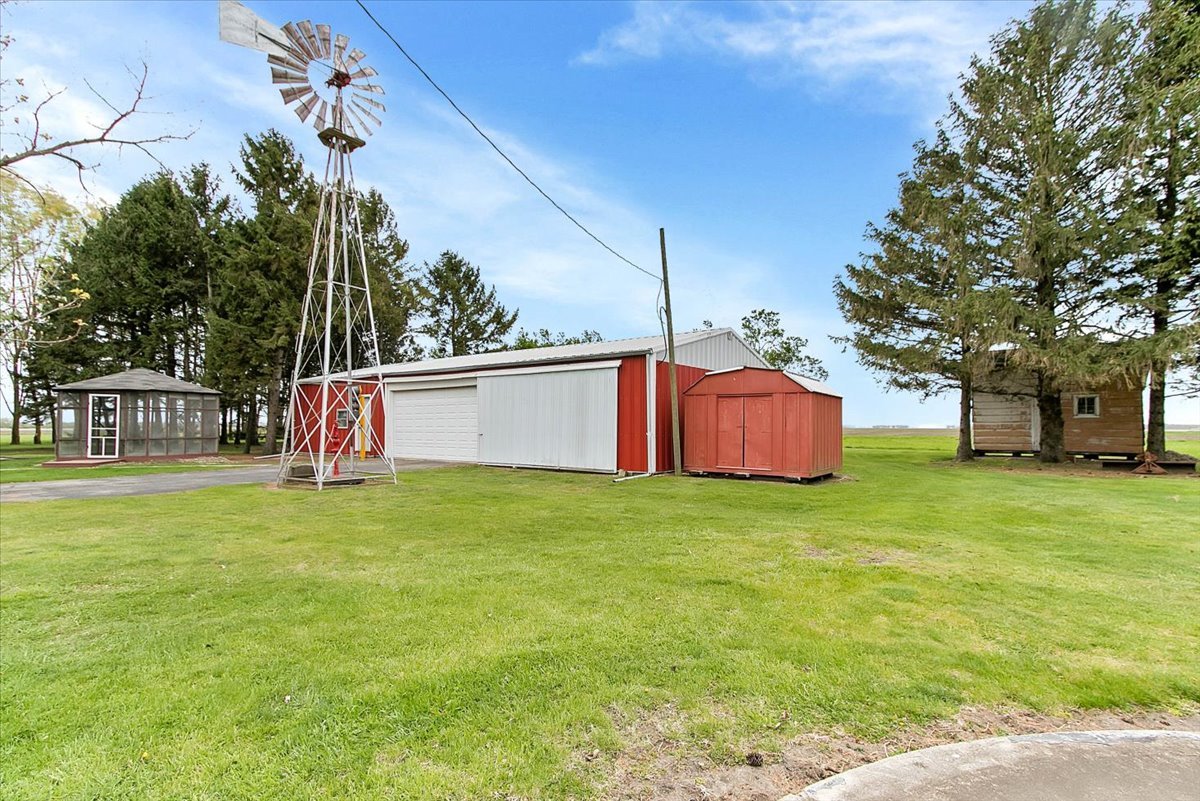 11535 South Kankakee Road Reddick, IL 60961 - Photo 8 of 52 a view of a trees with barn in the background