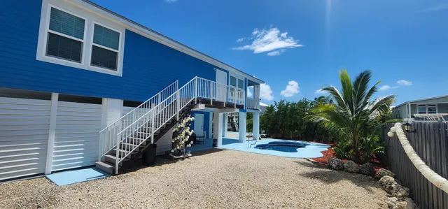 a view of a livingroom with a staircase