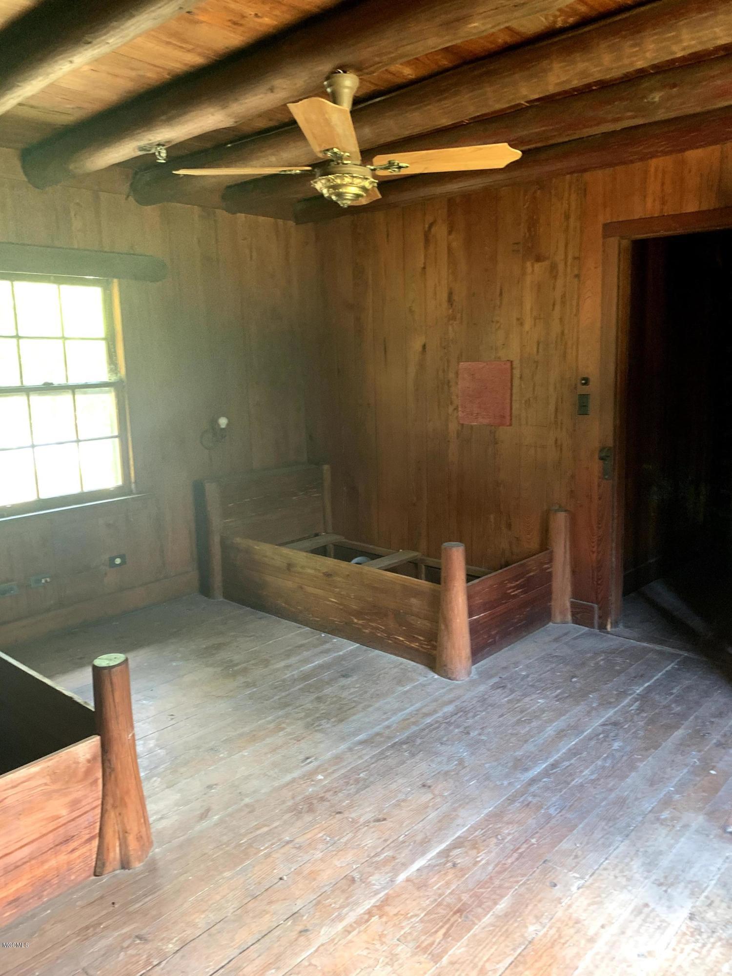 6670 Crump Road Kiln, MS 39556 - Photo 29 of 58 Lodge bedroom