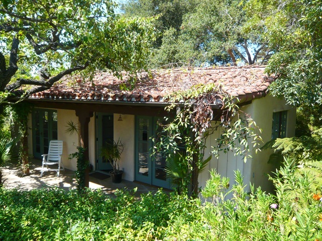 8 San Ysidro Road Montecito, CA 93108 - Photo 1 of 4 a view of a house with a tree in a yard