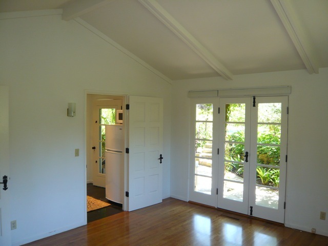 8 San Ysidro Road Montecito, CA 93108 - Photo 3 of 4 an empty room with wooden floor and windows