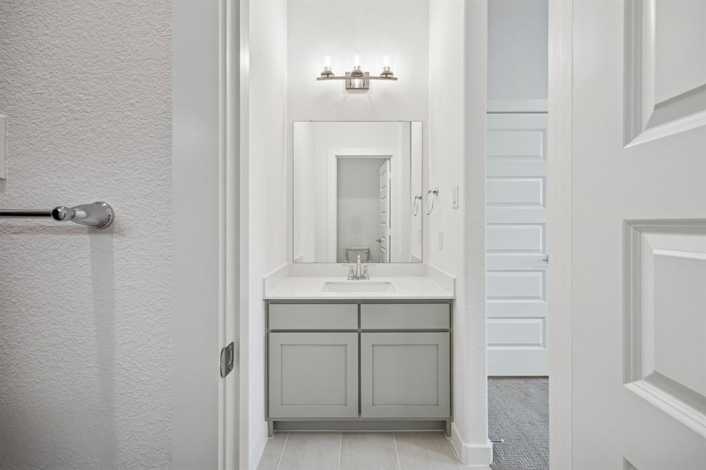 2121 Sunshining Road Princeton, TX 75407 - Photo 27 of 40 Bathroom in the Gilmour II home plan by Trophy Signature Homes – REPRESENTATIVE PHOTO