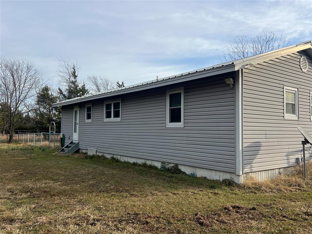 1335 Washburn Road North Bells, TX 75414 - Photo 11 of 12 a backyard of a house