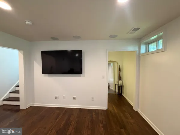 a view of livingroom with furniture and rug