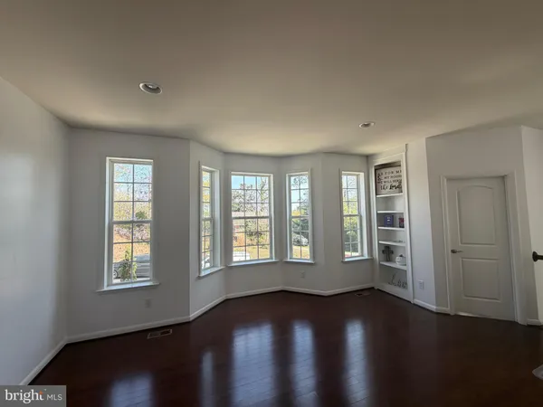 a bathroom with a glass door shower
