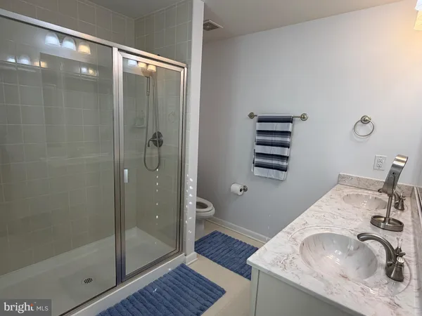 a view of a storage & utility room with wooden floor