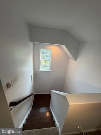 a view of entryway with wooden floor