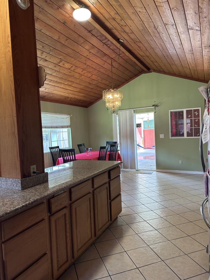 544 Sequoia Road Hayward, CA 94541 - Photo 14 of 34 a living room with hard wood flooring and a table