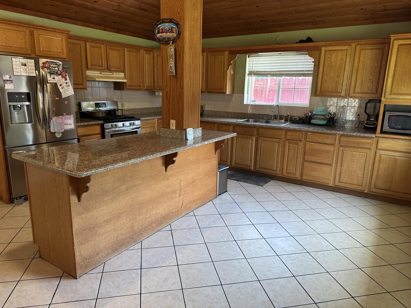 544 Sequoia Road Hayward, CA 94541 - Photo 18 of 34 a kitchen with stainless steel appliances granite countertop a sink stove and refrigerator