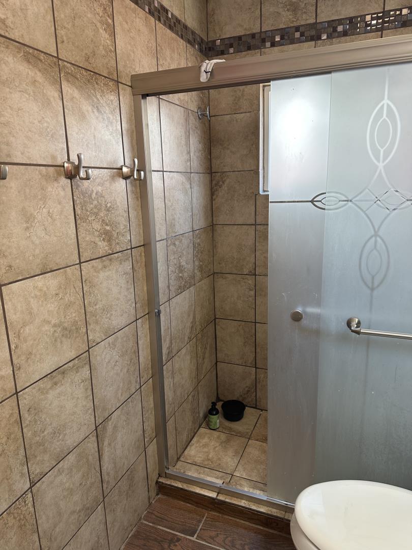 544 Sequoia Road Hayward, CA 94541 - Photo 22 of 34 a bathroom with a toilet and a shower
